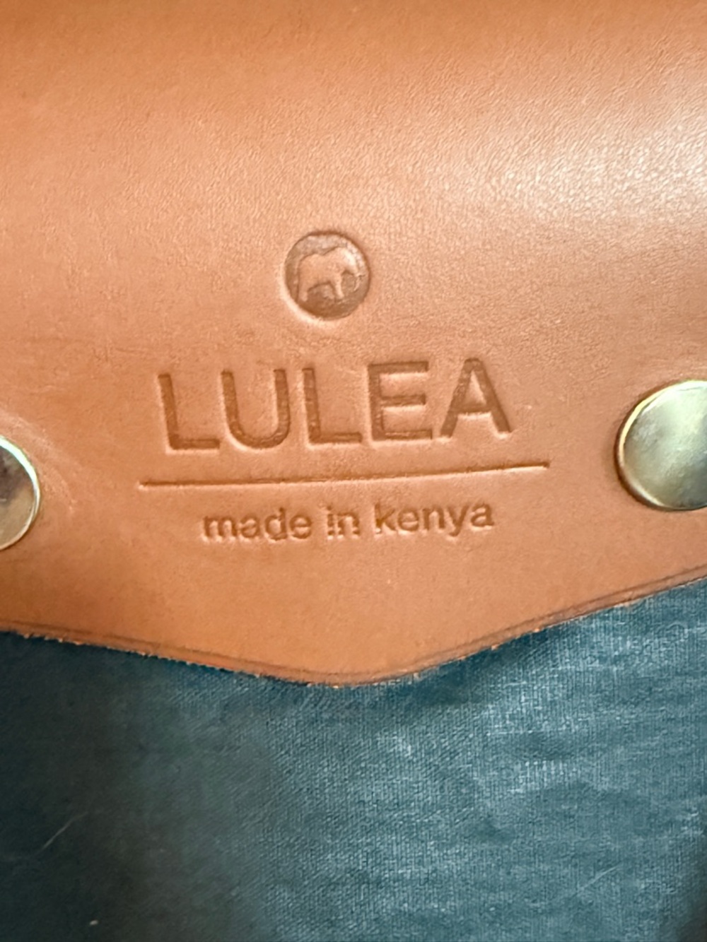 Lulea NWOT Made in Kenya
Leather Globally inspired
Foldable Tote boho/hobo vibes - Picture 2 of 8